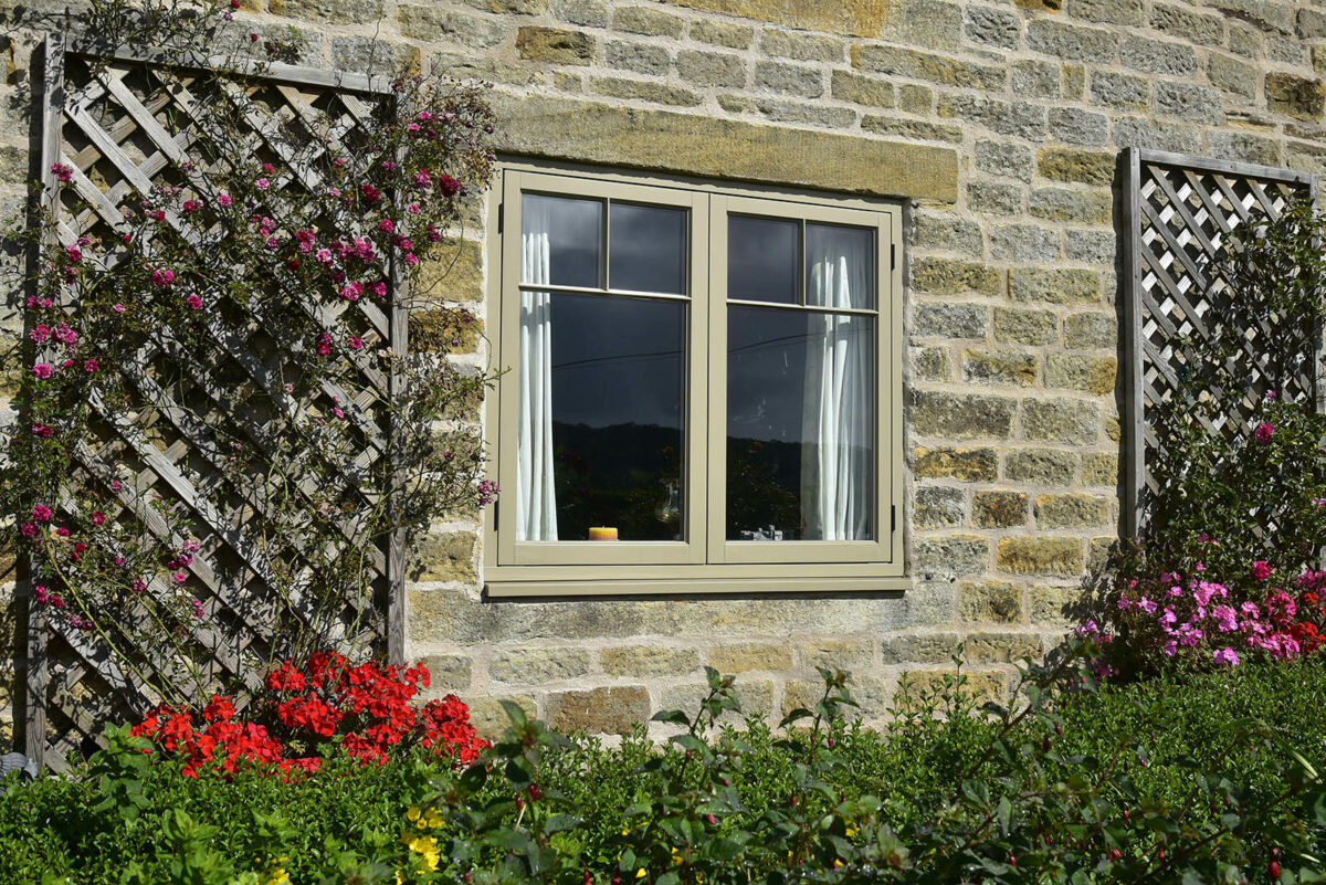 Cottage casement windows finished in Field Mouse