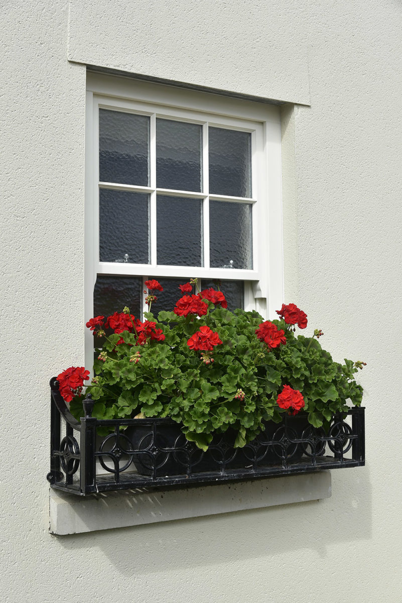 Slim sash window finished in colour complementary to Farrow & Ball Pointing