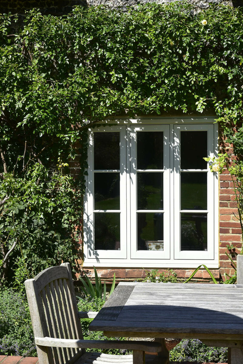 flush casement windows finished in Smoke Cream