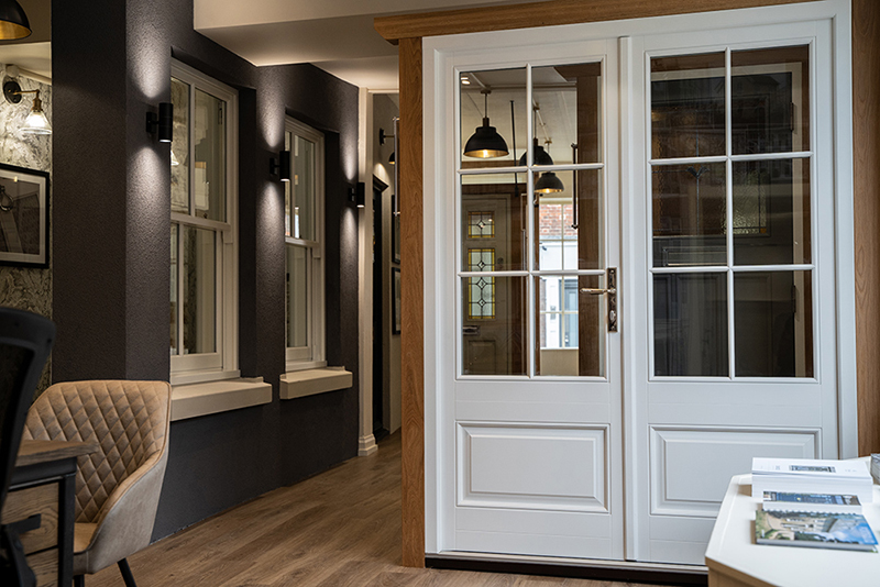 white french doors on display in a showroom