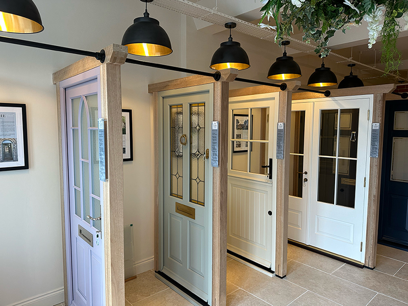 timber front doors on display in a showroom