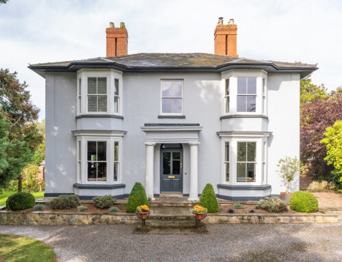 an impressive large house with victorian bay sash windows