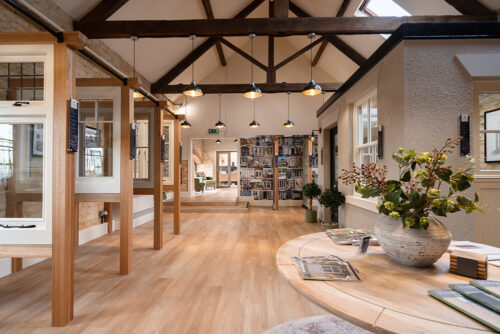 a selection of windows and doors on display in a showroom