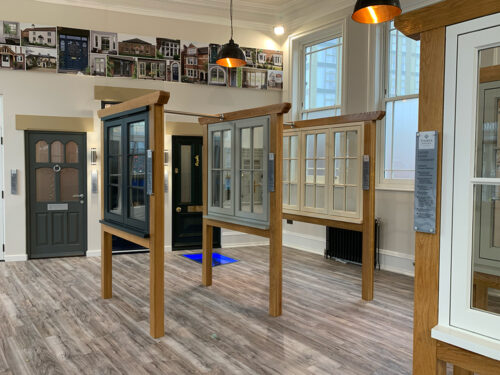 casement windows on display in a showroom