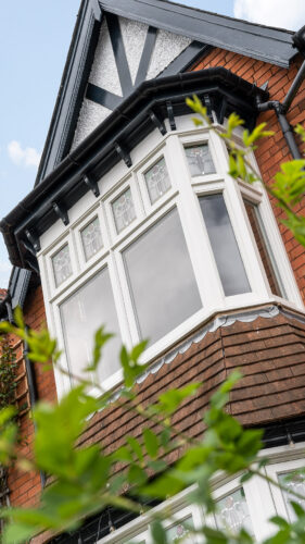 a white deco casement window bay