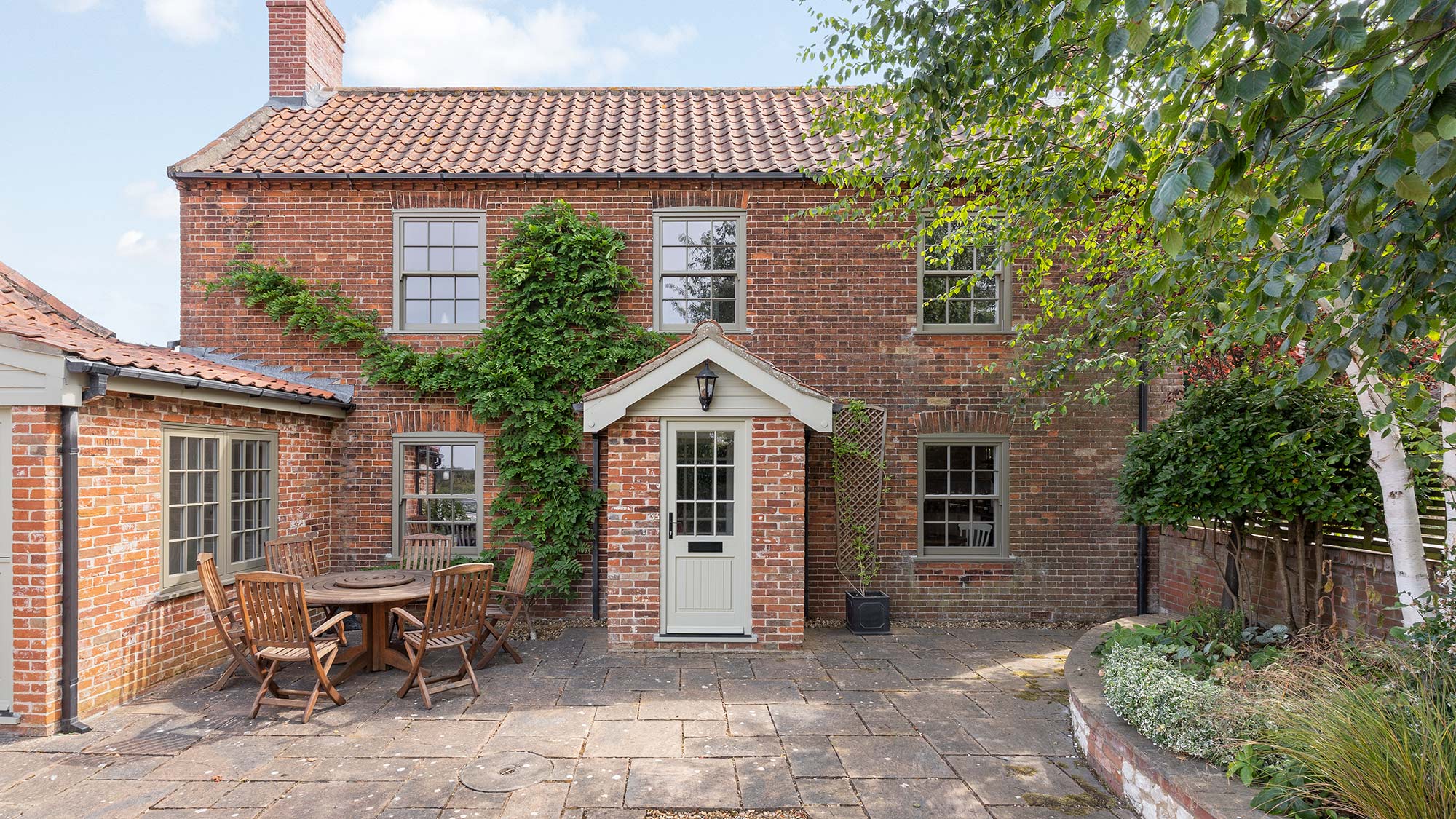a georgian farmhouse with sash windows