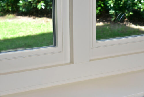 the inside of a casement window with contemporary moulding detailing