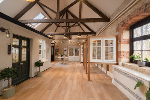 a timber windows and doors showroom in a converted barn